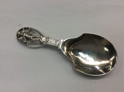 Lot 689 - 19th century Continental caddy spoon with Cupid finial