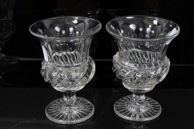 Lot 144 - Five 19th century cut glass vases, including two pairs and one larger example, all of goblet form, the largest measuring 24cm height