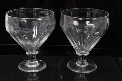 Lot 146 - Pair of early to mid 19th century oversized glass rummers, measuring 19cm height