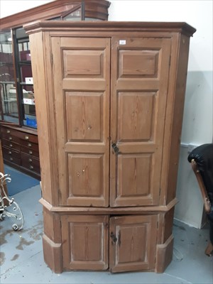 Lot 988 - Antique pine corner cupboard with shaped shelves and painted interior enclosed by panelled doors