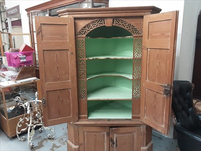 Lot 988 - Antique pine corner cupboard with shaped shelves and painted interior enclosed by panelled doors