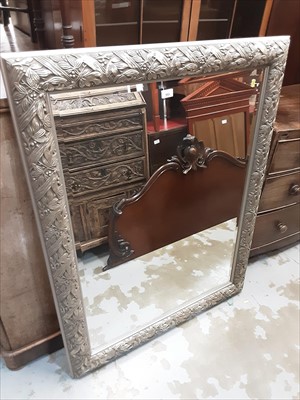 Lot 993 - Bevelled wall mirror in ornate silvered frame