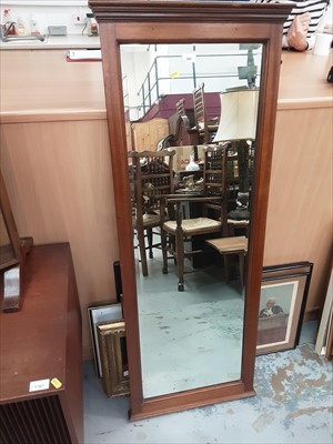 Lot 997 - Bevelled full length mirror in mahogany frame