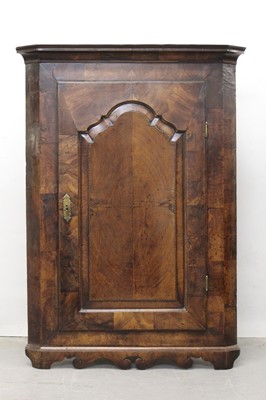 Lot 1285 - Early18th century walnut hanging corner cupboard.