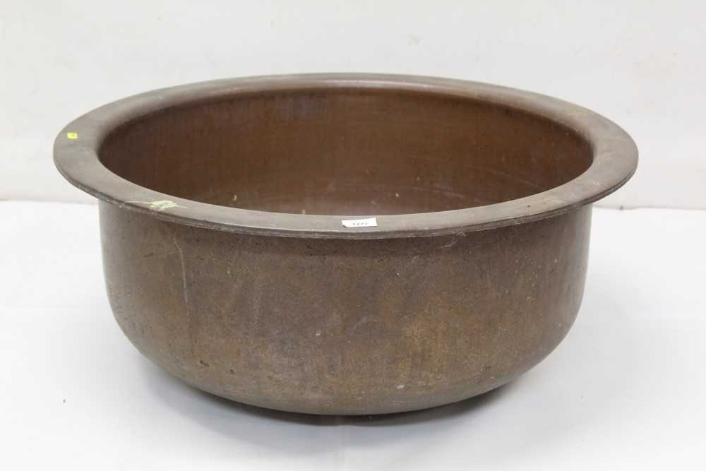 Lot 1277 - Very large copper vessel, of shallow form