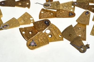 Lot 167 - Collection of 28 Georgian and later brass watch cocks, to include four 18th century finely pierced and engraved watch cocks