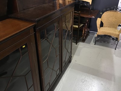 Lot 140 - Edwardian mahogany bookcase with two astragal glazed doors on bracket feet