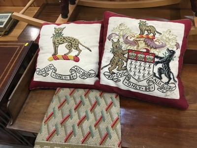 Lot 1047 - Two armorial tapestry cushions and one other