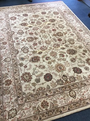 Lot 1053 - Chinese floral carpet on cream ground