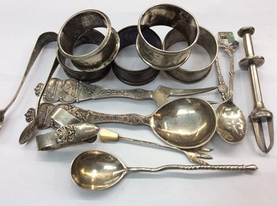 Lot 702 - Five various silver napkin rings, silver and white metal flatware