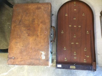 Lot 275 - Vintage brown leather suitcase together with a bagatelle board (2)