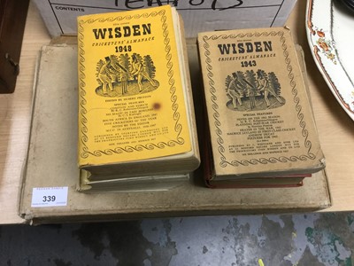 Lot 339 - Group of four Wisdens and a Janes fighting ships book