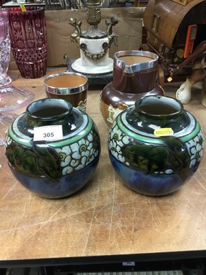 Lot 305 - Pair of Royal Doulton vases together with a Royal Doulton silver mounted harvest jug and beaker