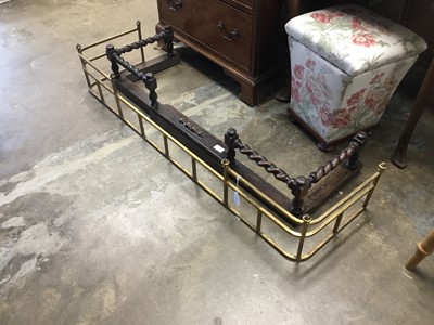 Lot 1071 - Edwardian gilt brass fender and oak barley twist fender