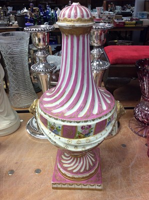 Lot 306 - Continental porcelain vase and cover with pink, gilt, floral swag decoration and lion mask handles