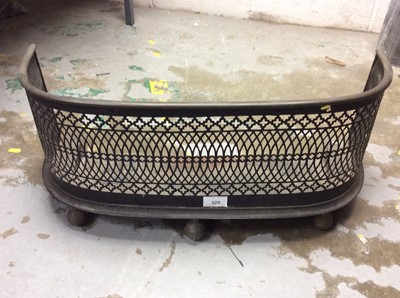 Lot 325 - Iron and brass fire curb of small proportions