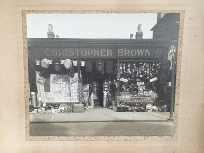 Lot 72 - Early 20th century photograph depicting Christopher Browns Stores, printed by the Cambridge Studios, together with other decorative works