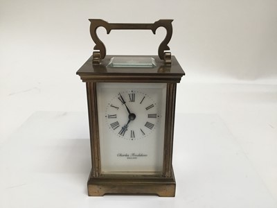Lot 350 - Good quality Charles Frodsham brass cased carriage clock, twin reeded pilasters, four bevelled glass panels and swing handle, with associated winding key