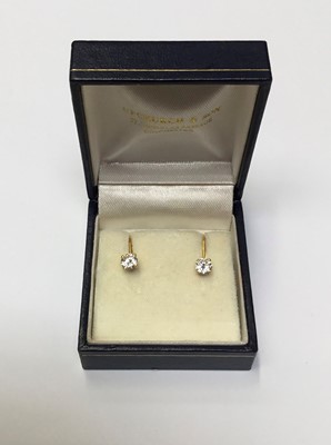 Lot 150 - Pair of diamond earrings, each with a round brilliant cut diamond in 18ct gold setting with screw back fittings, estimated total diamond weight approximately 0.60cts