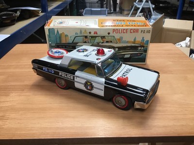 Lot 318 - 1960s Japanese Daiya tinplate friction powered police car P.D.110 in original box- near mint condition