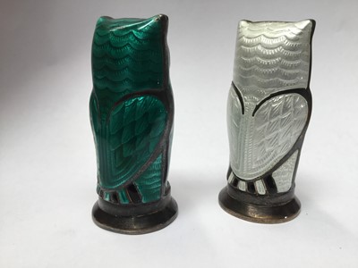 Lot 191 - Mid 20th century Norwegian silver and enamel owl pepper pots by David Anderson , one in white and the other in green enamel 55mm high
