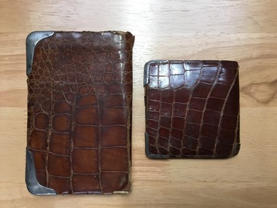 Lot 330 - Vintage Asprey gold and silver mounted crocodile wallet and another by Drew and Sons