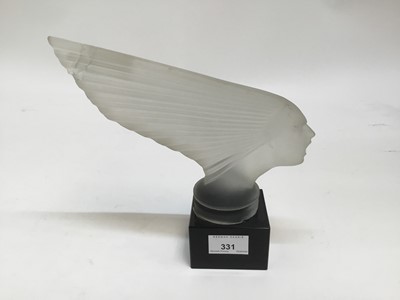 Lot 331 - Lalique-style frosted glass spirit of the wind car mascot (damaged) on glass plinth.26cm