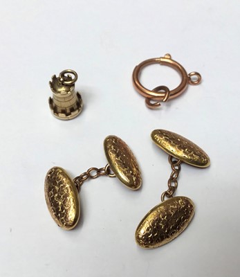 Lot 180 - Good quality Victorian yellow metal charm/fob in the form of a castle, and a pair of Victorian 9ct engraved gold cufflinks