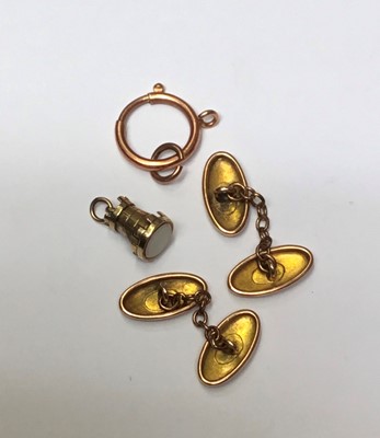 Lot 180 - Good quality Victorian yellow metal charm/fob in the form of a castle, and a pair of Victorian 9ct engraved gold cufflinks