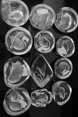 Lot 874 - Collection of twelve Mats Jonasson Swedish glass intaglio sculptures