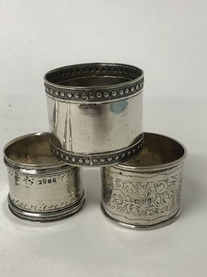 Lot 189 - A mixed group of silver and white metal to include: pair of late Victorian silver pepperettes with blue glass liners (London 1897), Victorian silver mustard pot with blue glass liner (London 1900),...