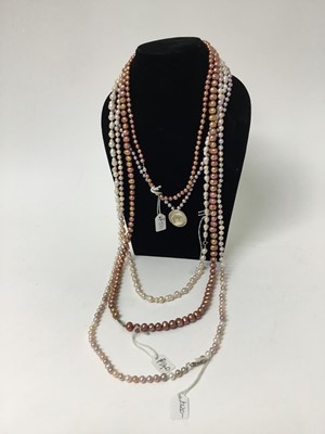 Lot 211 - Five freshwater pink cultured pearl necklaces with silver clasps