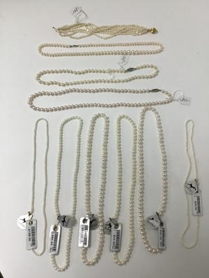 Lot 214 - Nine strings of freshwater cultured pearls, some with clasps