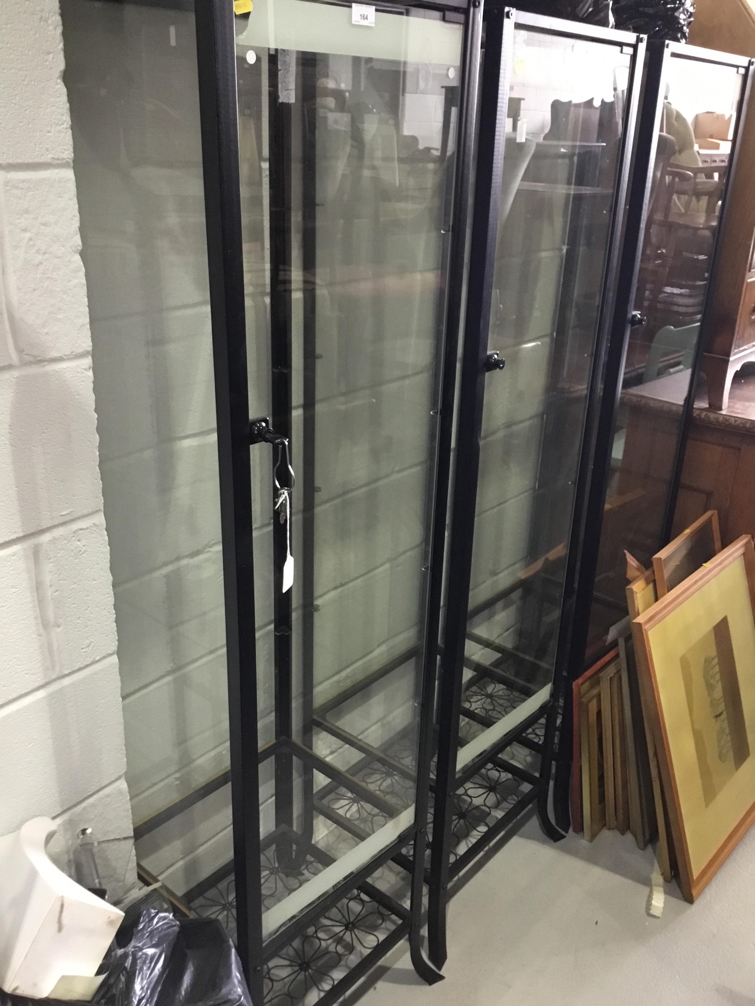 Lot 164 - Three black metal framed glass display