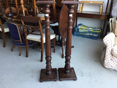 Lot 75 - Pair of mahogany torcheres with turned columns, square tops and bases, on bun feet, base 28cm in diameter, 112cm in height
