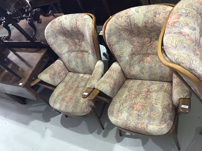 Lot 157 - Pair of Ercol easy chairs with floral upholstery together with another similar (3)