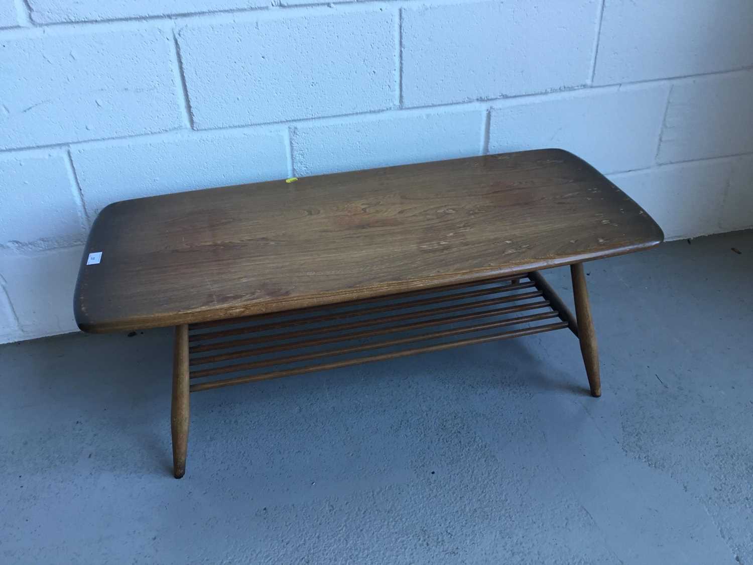 Lot 37 - Ercol 'Golden Dawn' coffee table of rectangular form with under tier, 104cm in length, 36cm in height, 45cm width