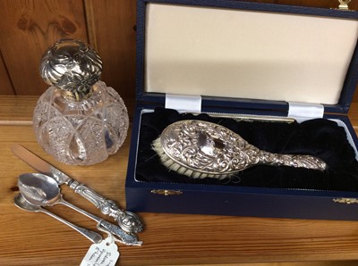 Lot 687 - Silver topped perfume, silver cased brush and three pieces silver flatware