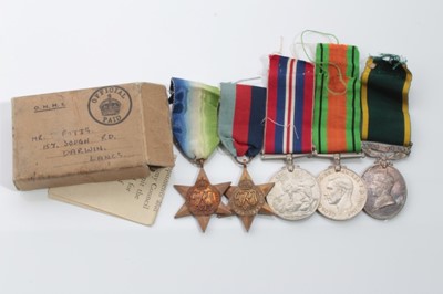 Lot 602 - Second World War and later medal group, comprising 1939 - 1945 Star, Atlantic Star, Defence, War and George VI Territorial Efficiency Medal named to 904614 GNR. J. Potts. R.A. with named box of iss...