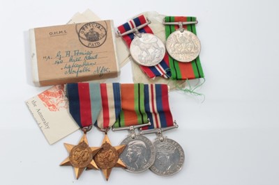 Lot 607 - Second World War medal group comprising 1939 - 1945 Star, France and Germany Star, Defence and War medals (mounted on bar) together with Second World War Defence and War medals in box of issue