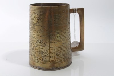 Lot 631 - Second World War brass tankard, engraved with the history of the Second World War, approx 12cm in height