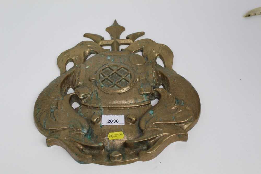 Lot 2036 - Brass shops crest