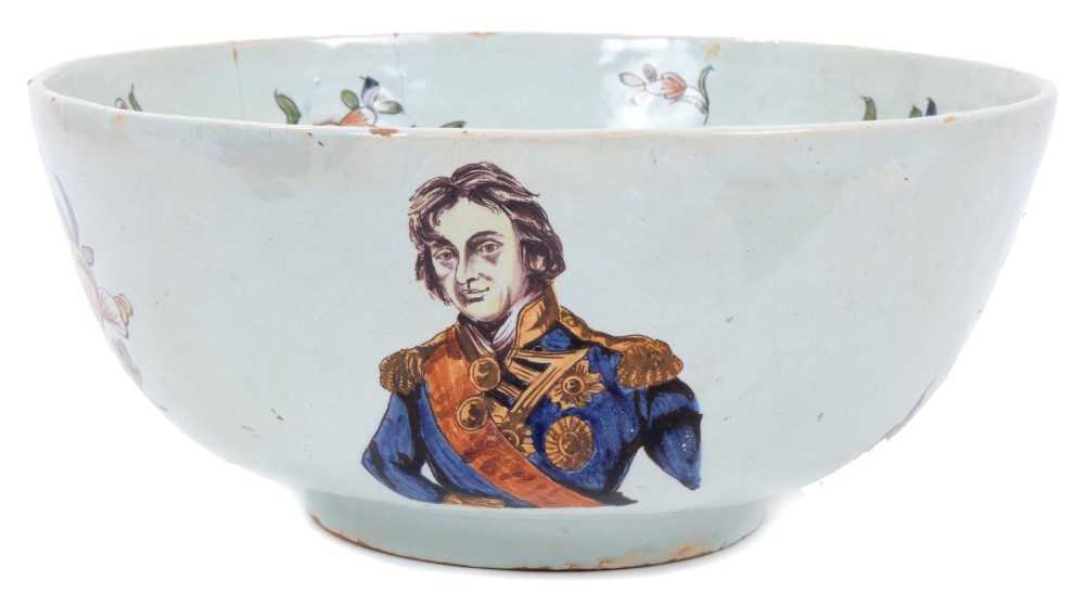 Lot 31 - Unusual polychrome Delft ware bowl, commemorating Nelson, with ship and floral decoration, 29cm diameter