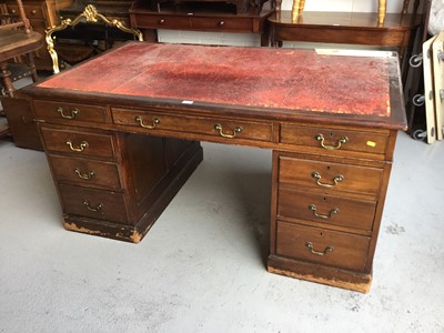 Lot 53 - Large Antique style mahogany twin pedestal desk, inset red leather top above an arrangement of nine draws around the knee hole 152cm in length, 77cm in height, 91cm in depth