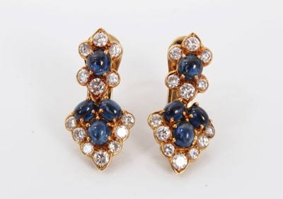 Lot 447 - Pair of sapphire and diamond pendant earrings with cabochon blue sapphires and brilliant cut diamonds in 18ct gold setting with clip fittings