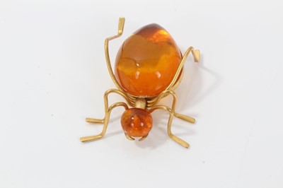Lot 453 - Amber spider brooch and an amber bracelet