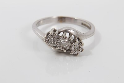 Lot 456 - 9ct gold diamond three stone ring