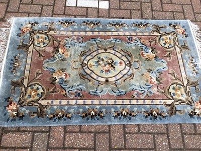 Lot 104 - Chinese silk rug with floral decoration, 157 x 93cm