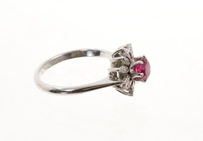 Lot 437 - Ruby and diamond flower head cluster ring