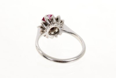 Lot 437 - Ruby and diamond flower head cluster ring
